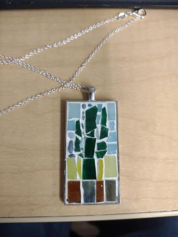 Small pendant with cactus made out of glass pieces