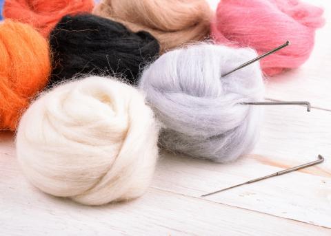 Wool and needles for needle felting